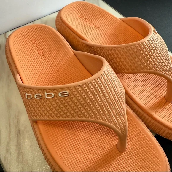 Bebe Vibrant Orange Rubbery Flip Flops - Picture 2 of 6